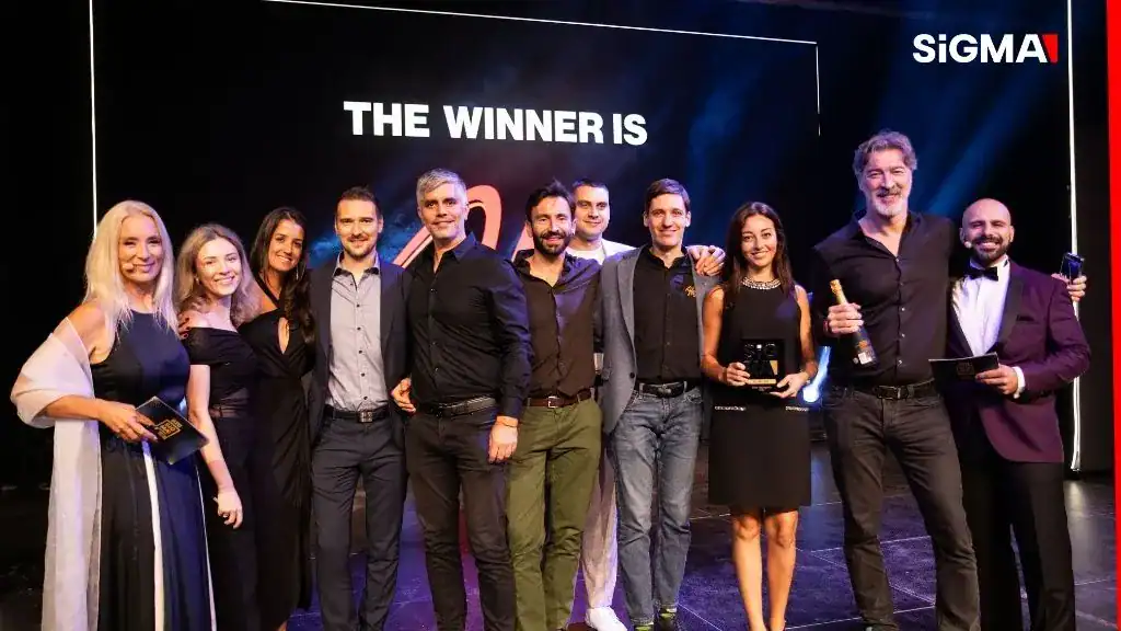 Alea team at the SiGMA Europe B2B Awards, on the stage receiving the recognition asBest Aggregator in 2024.